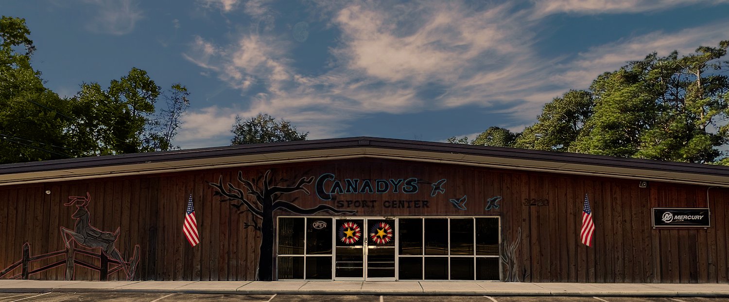 Canady's storefront honoring Memorial day with American flags,  gold star wreaths.